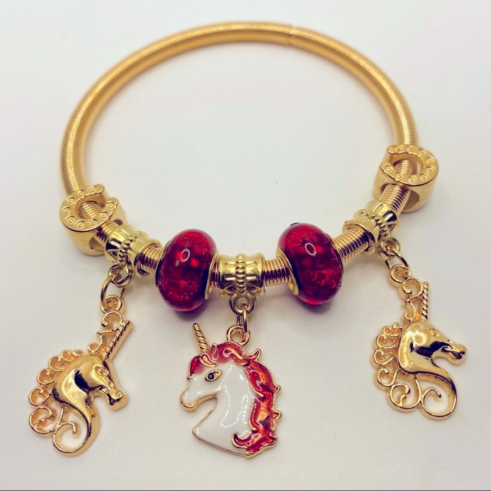 Bracelet golden Unicorns and lucky horse shoes